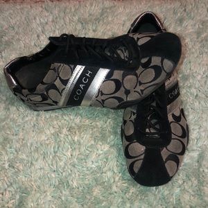 Black/silver Coach shoes.